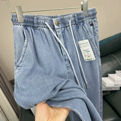Born for comfort! 100 days of silk! Summer men's foreign trade thin, smooth, wrinkle resistant, elastic waist casual jeans