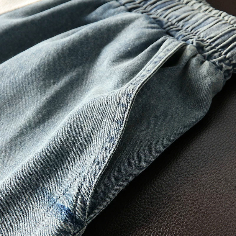 Highly recommended! Wash with water to make it old! Foreign trade men's summer elastic waist loose five quarter casual denim shorts trend
