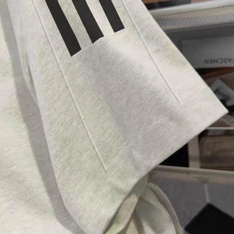 Overseas order backlog~Withdrawn foreign trade by cutting labels. Spring and summer European and American trendy brands with three bars, heavy weight, pure cotton short sleeved T-shirt