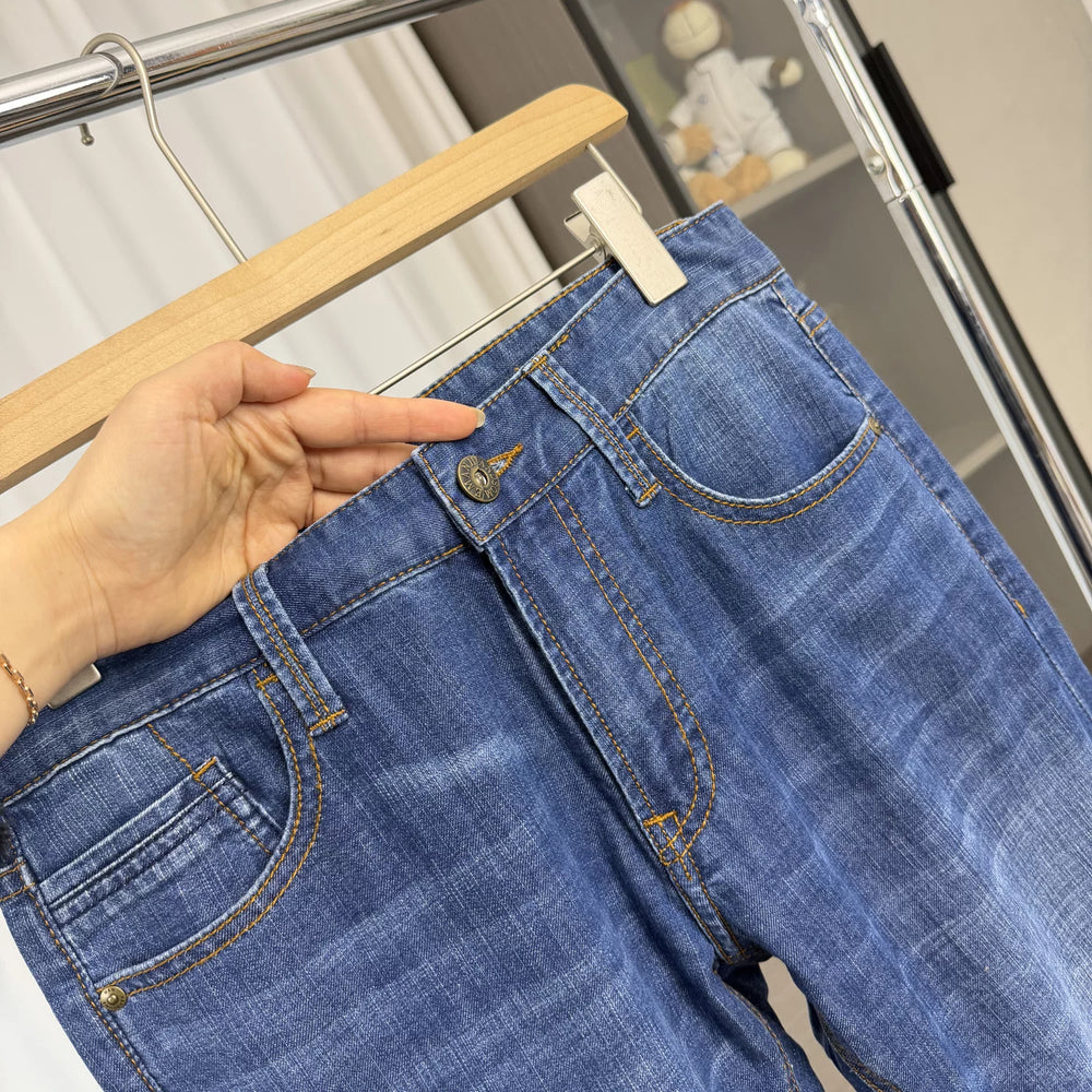 First line container removal and label cutting! Water washed elasticity! Spring men's trade washed versatile straight leg casual jeans