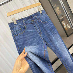 First line container removal and label cutting! Water washed elasticity! Spring men's trade washed versatile straight leg casual jeans