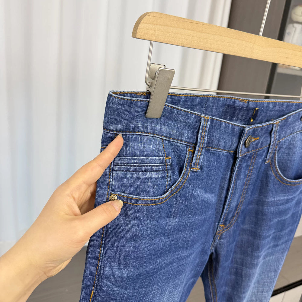 First line container removal and label cutting! Water washed elasticity! Spring men's trade washed versatile straight leg casual jeans