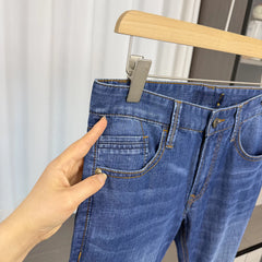 First line container removal and label cutting! Water washed elasticity! Spring men's trade washed versatile straight leg casual jeans