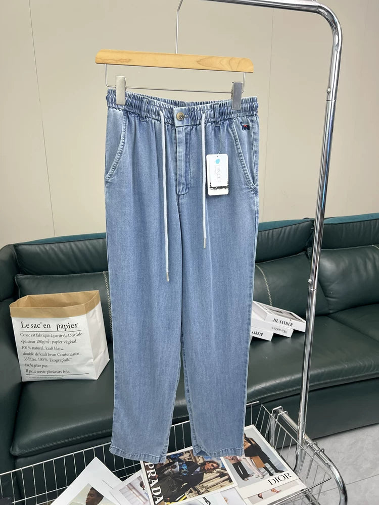 Born for comfort! 100 days of silk! Summer men's foreign trade thin, smooth, wrinkle resistant, elastic waist casual jeans