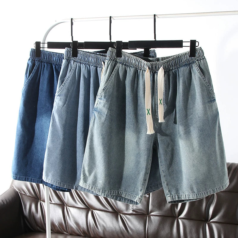 Highly recommended! Wash with water to make it old! Foreign trade men's summer elastic waist loose five quarter casual denim shorts trend
