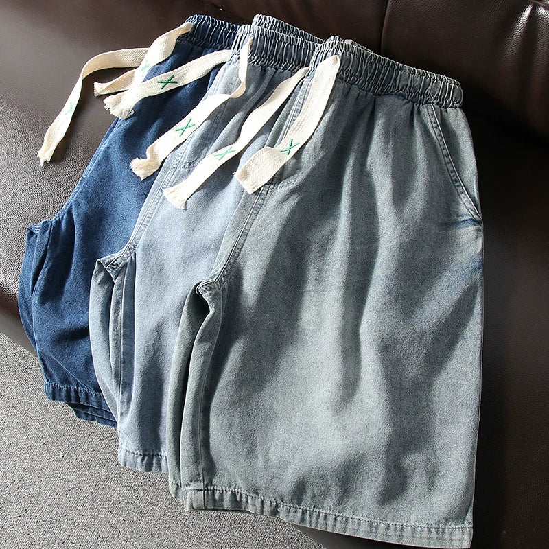 Highly recommended! Wash with water to make it old! Foreign trade men's summer elastic waist loose five quarter casual denim shorts trend