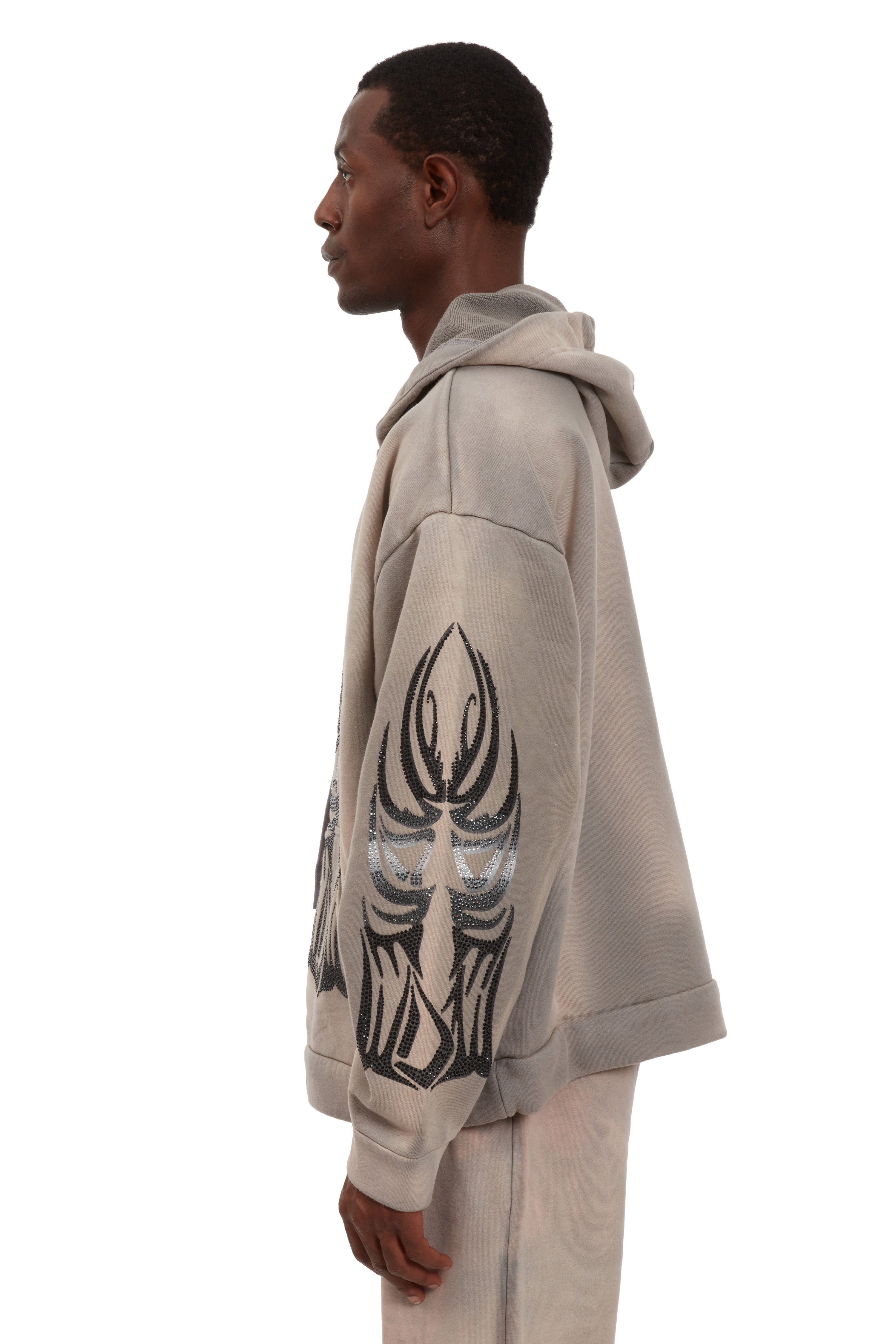 WINGED ZIP UP